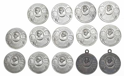 an image of a group of silver medals on a white background