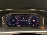the dashboard of a car with a digital display in the center