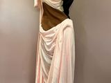 a dress on a mannequin on a mannequin stand