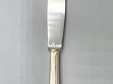 a knife that is sitting on top of a table
