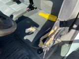 a picture of the inside of a vehicle with the seat up