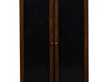 pair of antique wooden doors with black glass panels