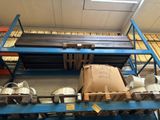 a rack with a lot of items on it in a warehouse