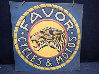 une pancarte sur laquelle sont inscrits « flavor cycles » et « motoss »