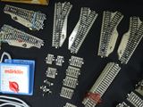 a lot of train tracks that are laying on a table