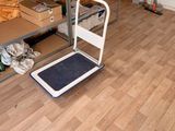 a room that has some boxes on a cart in it