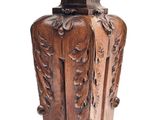 an image of a wooden table with a vase on top of it