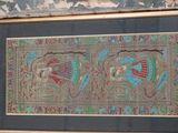 une image d'un tableau sur le mur d'un bâtiment
