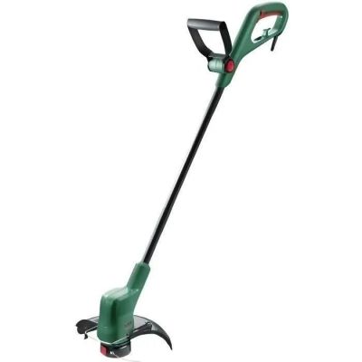 a green and black electric string trimmer on a white background