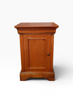 an image of a small wooden cabinet on a white background