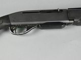 an old gun that is sitting on top of a table