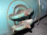 a large blue pipe that has some rust on it