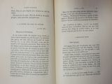 an open book with a picture of a cat on it