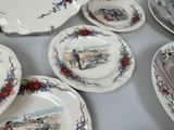 many plates that are sitting on a table