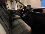 the interior of a car with the driver ' s seat folded down