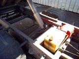 a close up of a truck ' s rear end with a fuel tank on it