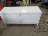 an image of a white cabinet in a garage