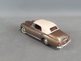 a toy car that is sitting on the floor