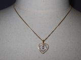 necklace with a heart shaped pendant on a mannequin mannequin mannequin mannequin mannequin mannequin mannequin mannequin