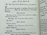 an open book with a black and white title on it