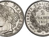 une pièce d'argent portant une tête de femme et des lauriers