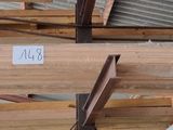 many pieces of wood stacked on top of each other