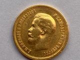 l'image d'une pièce d'or sur laquelle figure le visage d'un homme