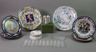 many different types of plates and cups on the table