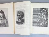 an open book with a drawing of a woman and a man in a turban