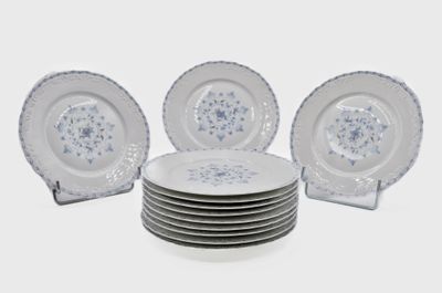 six plates stacked on top of each other on a table