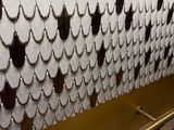a bench that has a lot of necklaces on it