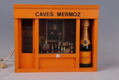 an orange box with a bottle of wine inside of it