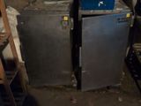 a lot of old appliances in the basement of a house