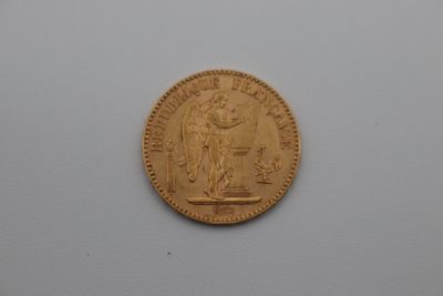 an image of a gold coin with the image of jesus on it
