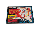 une boîte de jeux Nintendo posée sur une surface blanche