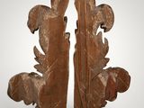 pair of carved wood bookends with acanthus and leaves