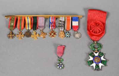 many medals and medals displayed on a shelf