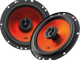 a pair of speakers with red and black trims on a white background