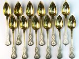 a lot of spoons that are sitting on a table
