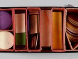 a box with many different colored items inside of it