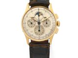 an 18k yellow gold chronograph wristwatch with moon phases