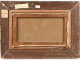 an old picture frame with a piece of paper taped to it