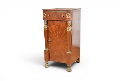 an image of a small wooden cabinet with a door