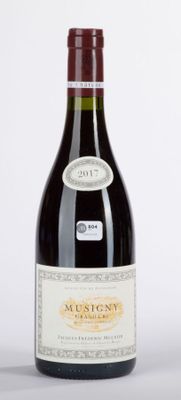 a bottle of wine that is sitting on a table