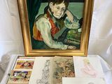 une photo d'un tableau posé sur une table recouverte de nombreux dessins