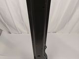a close up of a black metal pole on a white background