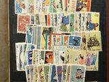 a picture of a picture of a bunch of stamps on the wall
