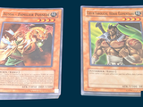 two cards that are sitting side by side on a table
