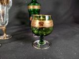 two wine glasses sitting next to each other on a table