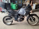 a motorcycle that is parked in a garage